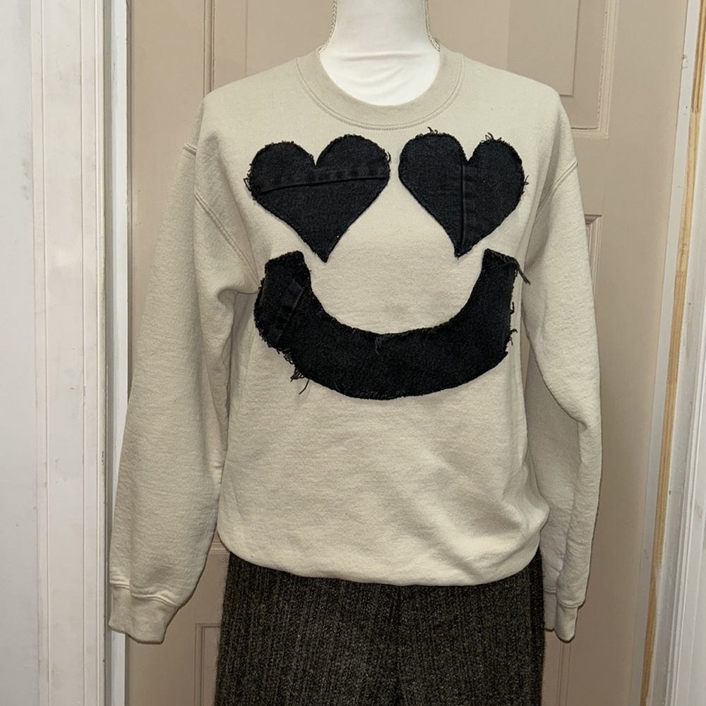 1 of a kind handmade Upcycled tan sweatshirt with black denim hearts & smile